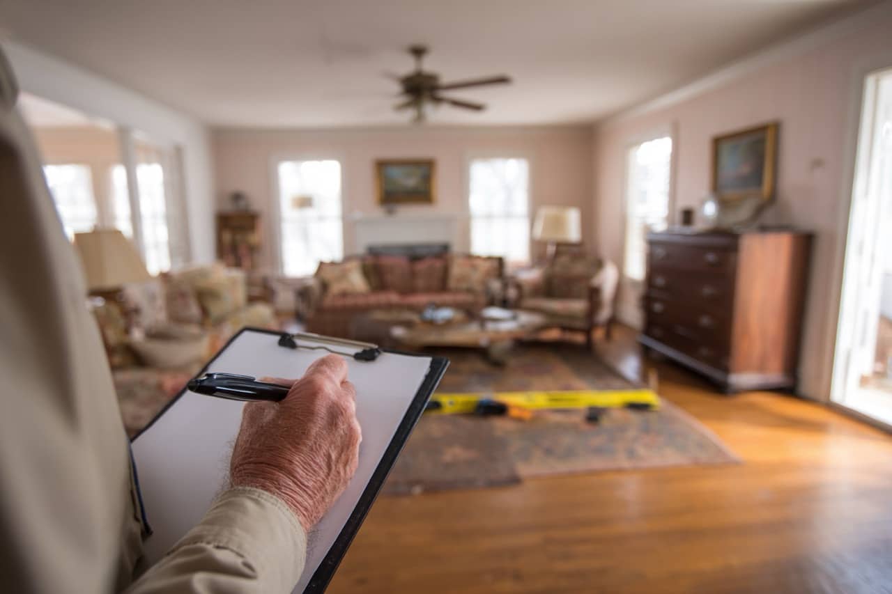 Professional appraiser evaluating inherited home in Wisconsin